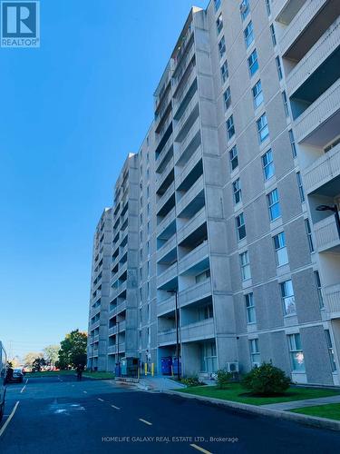 213 - 2 Glamorgan Avenue, Toronto, ON - Outdoor With Balcony With Facade