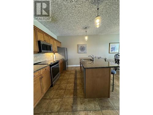 400 Bighorn Boulevard Unit# 416A, Radium Hot Springs, BC - Indoor Photo Showing Kitchen