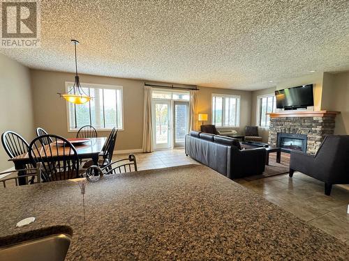 400 Bighorn Boulevard Unit# 416A, Radium Hot Springs, BC - Indoor Photo Showing Living Room With Fireplace