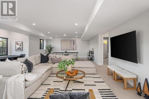 Basement Family Room - 202 - 9861 Glendon Drive, Middlesex Centre, ON - Indoor Photo Showing Living Room