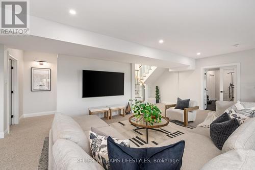 Basement Family Room - 202 - 9861 Glendon Drive, Middlesex Centre, ON - Indoor Photo Showing Living Room