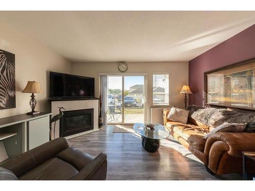 34-807 Railway Ave, Ashcroft, BC - Indoor Photo Showing Living Room With Fireplace