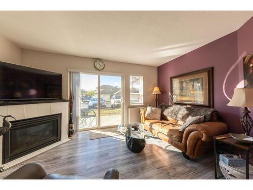 34-807 Railway Ave, Ashcroft, BC - Indoor Photo Showing Living Room With Fireplace