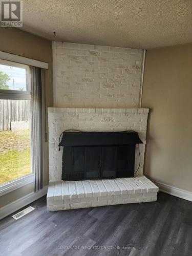 38 Gilmour Drive, Ajax, ON - Indoor Photo Showing Living Room With Fireplace