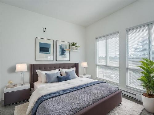 303-4052 Douglas St, Saanich, BC - Indoor Photo Showing Bedroom