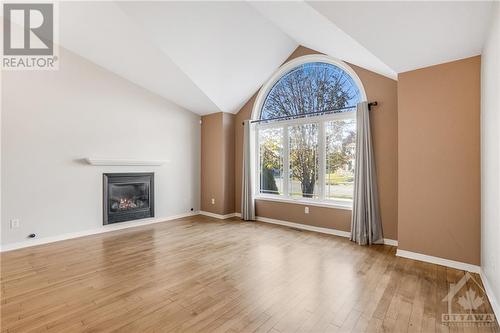 2257 Esprit Drive, Ottawa, ON - Indoor Photo Showing Living Room With Fireplace