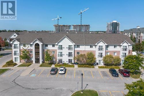 301 - 91 Aspen Springs Drive, Clarington (Bowmanville), ON - Outdoor With Facade