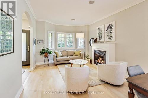 113 Winners Circle, Toronto, ON - Indoor Photo Showing Living Room With Fireplace