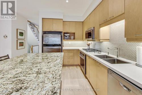 113 Winners Circle, Toronto, ON - Indoor Photo Showing Kitchen With Double Sink With Upgraded Kitchen