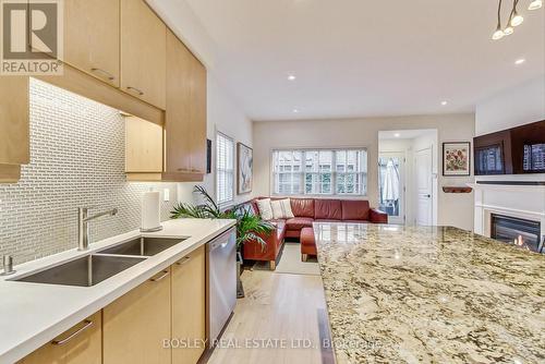 113 Winners Circle, Toronto, ON - Indoor Photo Showing Kitchen With Double Sink