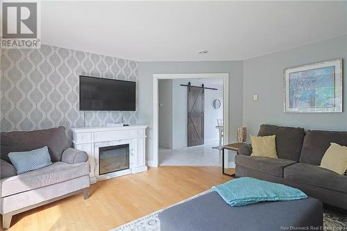 91 Dykeman Street, Fredericton, NB - Indoor Photo Showing Living Room With Fireplace