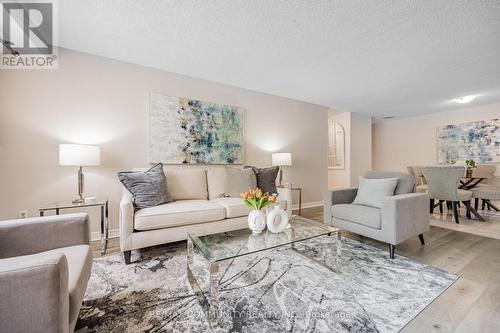 103 - 10 Tapscott Road, Toronto, ON - Indoor Photo Showing Living Room