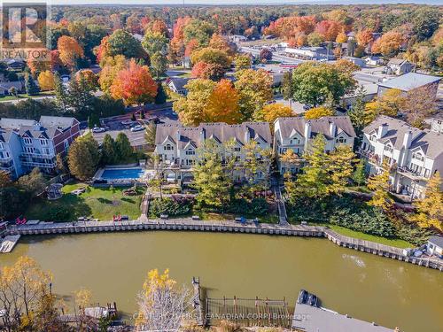 Riverfront Condo Just 5 Minute Boat Ride to Lake - 20 - 40 Ontario Street S, Lambton Shores (Grand Bend), ON - Outdoor With Body Of Water With View