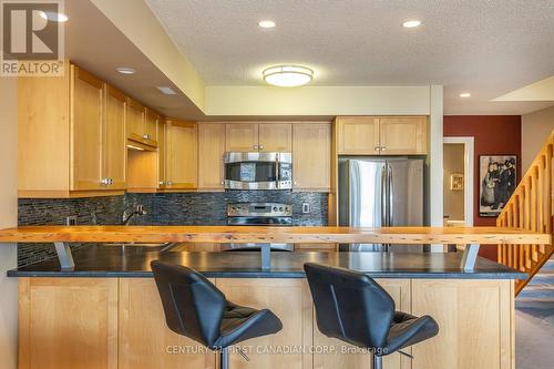 20 - 40 Ontario Street S, Lambton Shores (Grand Bend), ON - Indoor Photo Showing Kitchen With Stainless Steel Kitchen With Double Sink