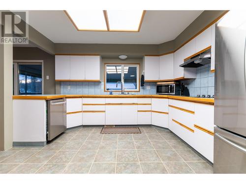 7455 S Kelly Road, Prince George, BC - Indoor Photo Showing Kitchen With Double Sink