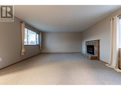 7455 S Kelly Road, Prince George, BC - Indoor With Fireplace