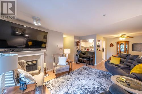 130 Abbott Street Unit# 309, Penticton, BC - Indoor Photo Showing Living Room With Fireplace