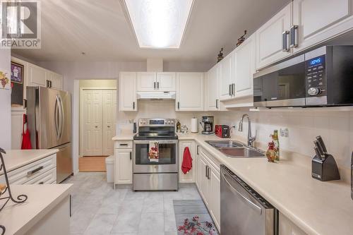 130 Abbott Street Unit# 309, Penticton, BC - Indoor Photo Showing Kitchen With Double Sink