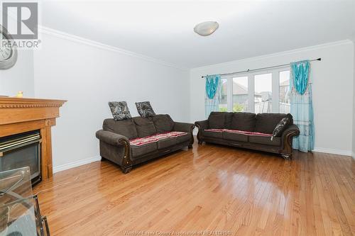 152 Shady Spring Crescent, Lakeshore, ON - Indoor Photo Showing Living Room With Fireplace