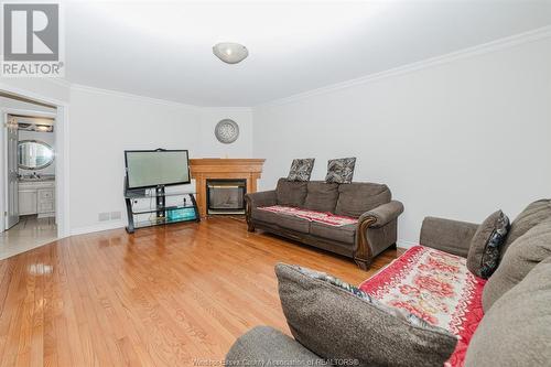 152 Shady Spring Crescent, Lakeshore, ON - Indoor Photo Showing Living Room With Fireplace