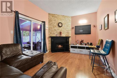 6104 Vineyard Drive, Ottawa, ON - Indoor Photo Showing Living Room With Fireplace