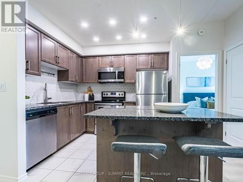 313 - 620 Sauve Street, Milton, ON - Indoor Photo Showing Kitchen With Stainless Steel Kitchen With Upgraded Kitchen