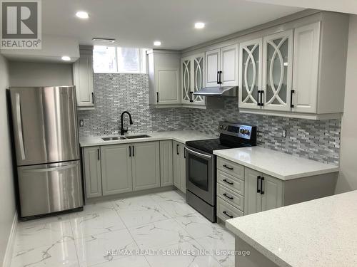 61 Dotchson Avenue, Caledon, ON - Indoor Photo Showing Kitchen With Double Sink With Upgraded Kitchen