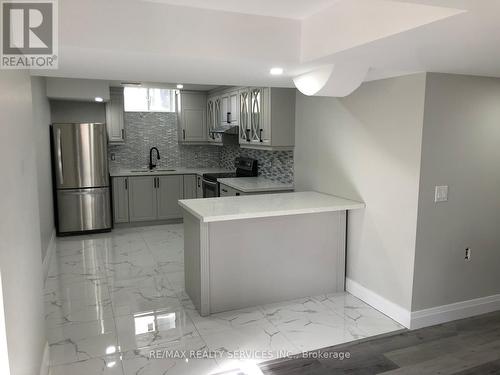 61 Dotchson Avenue, Caledon, ON - Indoor Photo Showing Kitchen