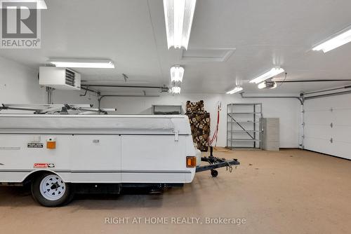 9695 Baldwin Street N, Whitby, ON - Indoor Photo Showing Garage