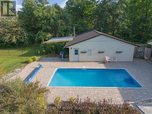 9695 Baldwin Street N, Whitby, ON - Outdoor With In Ground Pool With Backyard