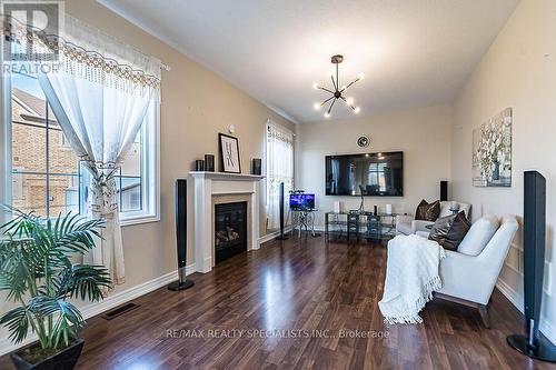 26 Clearfield Drive, Brampton, ON - Indoor Photo Showing Living Room With Fireplace