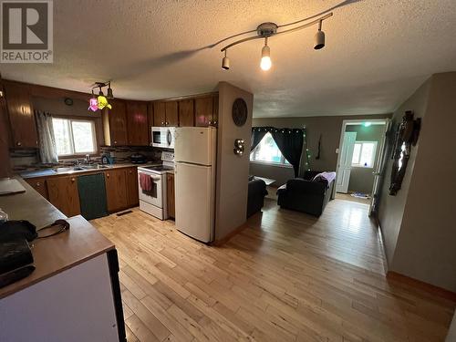 5251 42 Street, Fort Nelson, BC - Indoor Photo Showing Kitchen With Double Sink