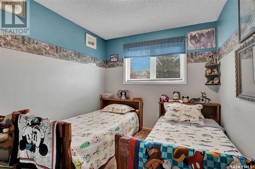 702 4Th Street S, Martensville, SK - Indoor Photo Showing Bedroom