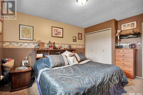 702 4Th Street S, Martensville, SK - Indoor Photo Showing Bedroom