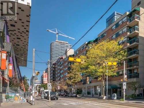 628 - 73 Mccaul Street, Toronto, ON - Outdoor With Balcony With Facade