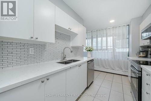 305 - 5580 Sheppard Avenue E, Toronto, ON - Indoor Photo Showing Kitchen With Double Sink With Upgraded Kitchen