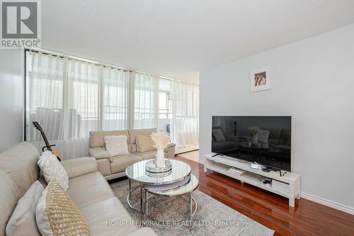 305 - 5580 Sheppard Avenue E, Toronto, ON - Indoor Photo Showing Living Room