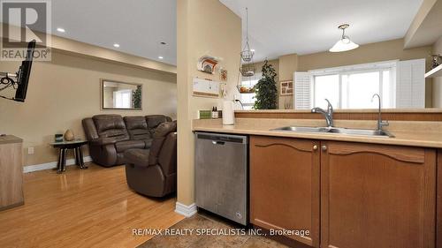 100 - 16 Bellhaven Crescent, Brampton, ON - Indoor Photo Showing Kitchen With Double Sink