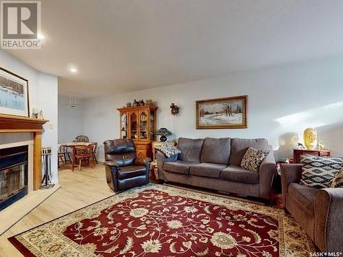 26 2338 Assiniboine Avenue E, Regina, SK - Indoor Photo Showing Living Room With Fireplace