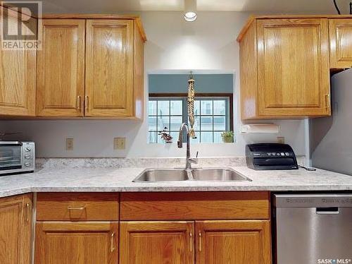 26 2338 Assiniboine Avenue E, Regina, SK - Indoor Photo Showing Kitchen With Double Sink