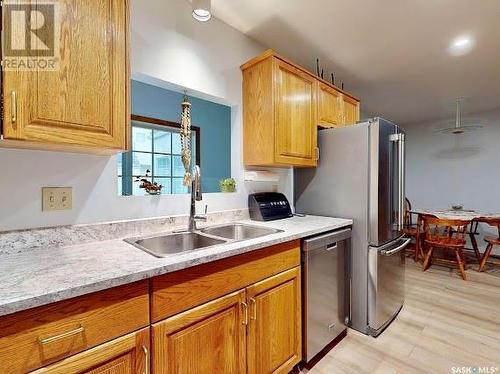 26 2338 Assiniboine Avenue E, Regina, SK - Indoor Photo Showing Kitchen With Double Sink