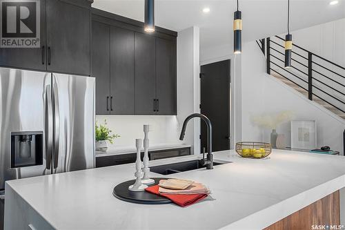 131 Asokan Street, Saskatoon, SK - Indoor Photo Showing Kitchen With Double Sink With Upgraded Kitchen