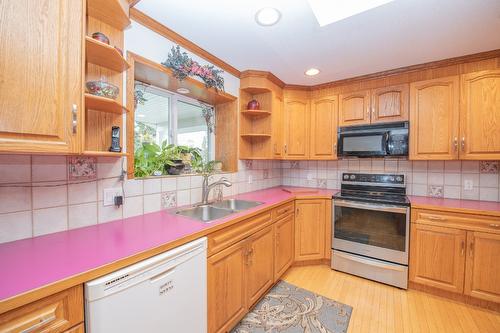 7706 Giles Drive, Coldstream, BC - Indoor Photo Showing Kitchen With Double Sink