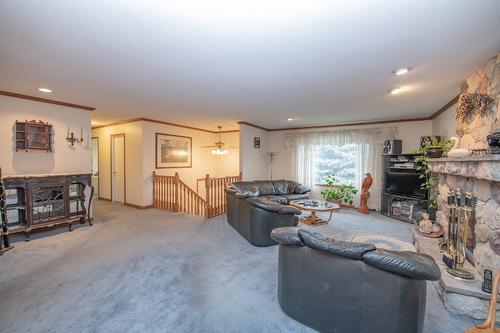 7706 Giles Drive, Coldstream, BC - Indoor With Fireplace