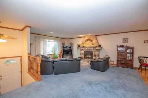 7706 Giles Drive, Coldstream, BC - Indoor With Fireplace