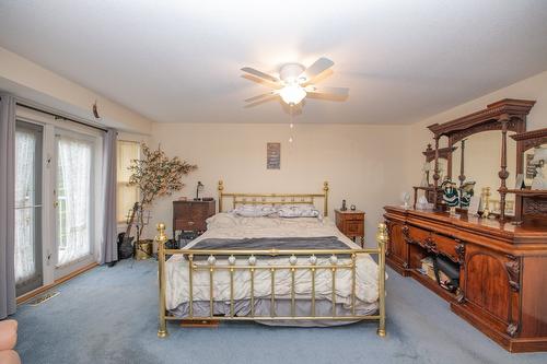 7706 Giles Drive, Coldstream, BC - Indoor Photo Showing Bedroom