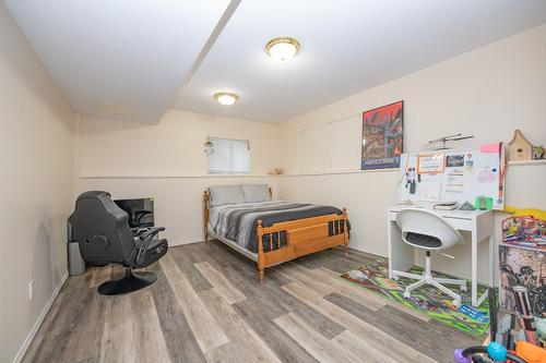 7706 Giles Drive, Coldstream, BC - Indoor Photo Showing Bedroom