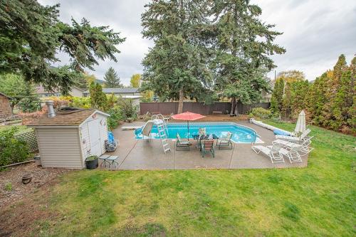 7706 Giles Drive, Coldstream, BC - Outdoor With In Ground Pool With Backyard