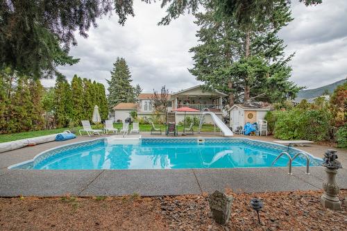 7706 Giles Drive, Coldstream, BC - Outdoor With In Ground Pool With Backyard