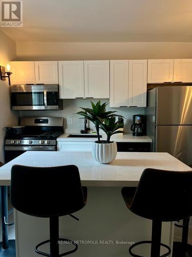 4910 Bridge Street, Niagara Falls, ON - Indoor Photo Showing Kitchen With Stainless Steel Kitchen With Double Sink